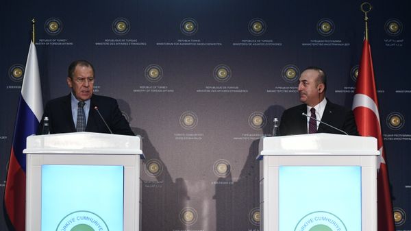 Russian Foreign Minister Sergei Lavrov, left, and Turkish Foreign Minister Mevlut Cavusoglu at a news conference following a meeting in Turkey - Sputnik International