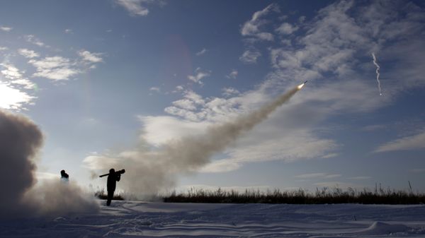 Ukrainian soldiers fire missiles with man-portable air-defense systems, file photo. - Sputnik International