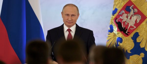 Russian President Vladimir Putin smiles as he gives his annual state of the nation address in the Kremlin in Moscow, Russia, Thursday, Dec. 1, 2016. - Sputnik International