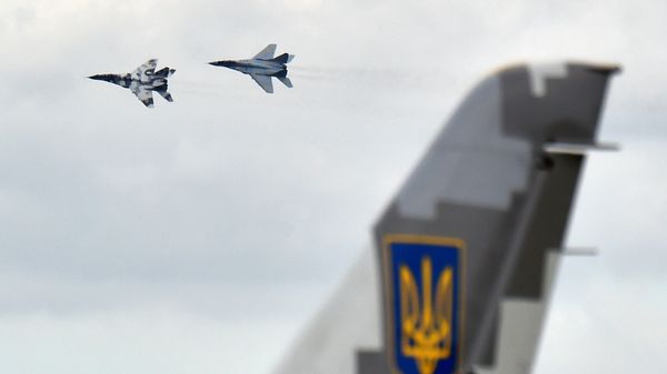 Ukrainian Air force MIG 29 fighter planes take part in practical flights during an exercise at the Air Force military base in Vasylkiv, some 40km from Kiev on August 3, 2016 - Sputnik International