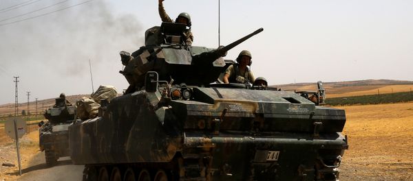 A Turkish soldier on an armoured personnel carrier waves as they drive from the border back to their base in Karkamis on the Turkish-Syrian border in the southeastern Gaziantep province, Turkey, August 27, 2016 A Turkish soldier on an armoured personnel carrier waves as they drive from the border back to their base in Karkamis on the Turkish-Syrian border in the southeastern Gaziantep province, Turkey, August 27, 2016 - Sputnik International