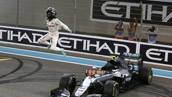 Mercedes driver Nico Rosberg of Germany celebrates after finishing second to win the 2016 world championship during the Emirates Formula One Grand Prix at the Yas Marina racetrack in Abu Dhabi, United Arab Emirates, Sunday, Nov. 27, 2016 - Sputnik International
