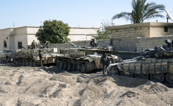 Syrian Army modified T-72 tanks hold a position during Syrian forces' assault to capture the rebel-held village of Hawsh Nasri, which is located near the rebel-held town of Douma on the eastern outskirts of the capital Damascus - Sputnik International