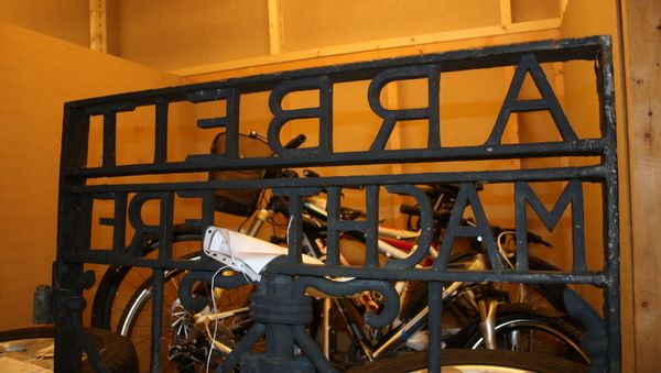 A handout picture made available to Reuters on December 2, 2016 shows the iron gate from the Dachau concentration camp in Germany bearing the notorious Arbeit macht frei (work sets you free) slogan, which has been recovered in west Norway two years after it was stolen, police said - Sputnik International