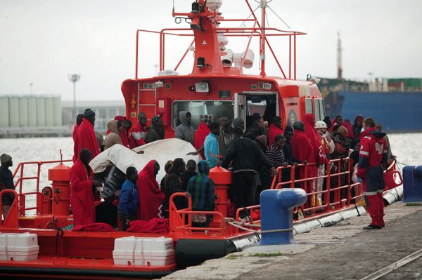 Migrants, who were part of a group intercepted aboard a dinghy off the coast in the Mediterranean sea, stand on a rescue boat upon arriving at a port in Malaga, southern Spain, December 3, 2016 - Sputnik International