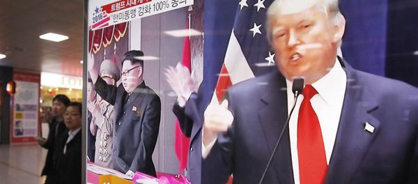 In this Nov. 10, 2016 file photo, a TV screen shows pictures of U.S. President-elect Donald Trump, right, and North Korean leader Kim Jong Un, at the Seoul Railway Station in Seoul, South Korea In this Nov. 10, 2016 file photo, a TV screen shows pictures of U.S. President-elect Donald Trump, right, and North Korean leader Kim Jong Un, at the Seoul Railway Station in Seoul, South Korea - Sputnik International