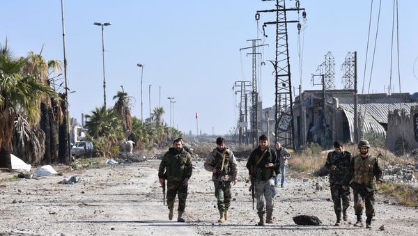 Syrian pro-government forces advance in the Myessar district in east Aleppo in an ongoing operation to recapture all of the battered second city, on December 4, 2016 Syrian pro-government forces advance in the Myessar district in east Aleppo in an ongoing operation to recapture all of the battered second city, on December 4, 2016 - Sputnik International