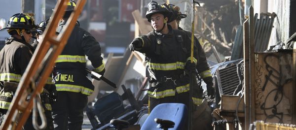 Firefighters assess the scene where a deadly fire tore through a late-night electronic music party in a warehouse in Oakland, Calif., Saturday, Dec. 3, 2016. Officials described the scene inside the warehouse, which had been illegally converted into artist studios, as a death trap that made it impossible for many partygoers to escape the Friday night fire. - Sputnik International