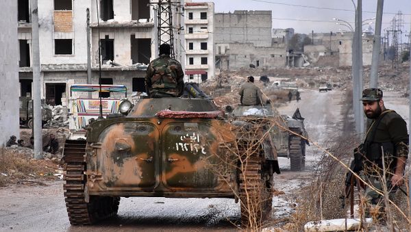 Syrian pro-government forces set up an outpost on December 2, 2016 in the Aleppo's eastern neighbourhood of Sakan al-Shababi after they retook from rebel fighters Syrian pro-government forces set up an outpost on December 2, 2016 in the Aleppo's eastern neighbourhood of Sakan al-Shababi after they retook from rebel fighters - Sputnik International