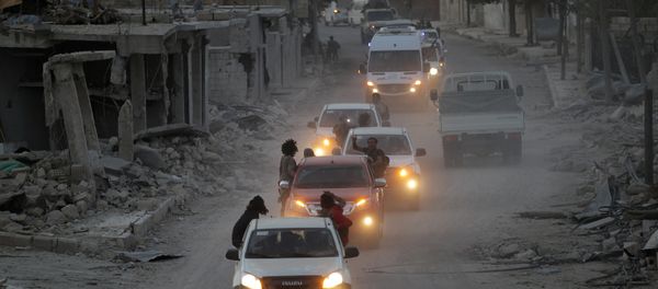 Rebel fighters drive their vehicles celebrating what they said was the taking over of Baraghedeh and Kafr-Ghan towns, in al-Rai town, northern Aleppo countryside, Syria October 10, 2016 Rebel fighters drive their vehicles celebrating what they said was the taking over of Baraghedeh and Kafr-Ghan towns, in al-Rai town, northern Aleppo countryside, Syria October 10, 2016 - Sputnik International