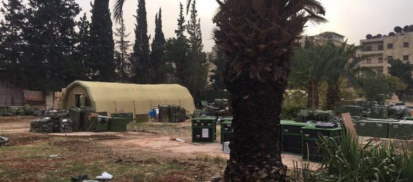 Russian defense ministry's mobile hospital in Aleppo comes under gunfire attack Russian defense ministry's mobile hospital in Aleppo comes under gunfire attack - Sputnik International