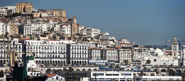 A general view taken on June 5, 2014 shows the Grand Mosque (R) situated on the promenade along the Bay of Algiers with the old town of the Algerian capital known as the Kasbah in the background. A general view taken on June 5, 2014 shows the Grand Mosque (R) situated on the promenade along the Bay of Algiers with the old town of the Algerian capital known as the Kasbah in the background. - Sputnik International