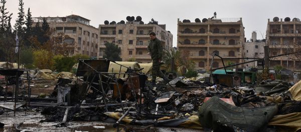 A Russian soldier inspects the damage at a Russian military field hospital after it was shelled by what the Russian Defence Ministry said were Syrian rebels in Aleppo, Syria, in this handout picture provided by SANA on December 5, 2016. A Russian soldier inspects the damage at a Russian military field hospital after it was shelled by what the Russian Defence Ministry said were Syrian rebels in Aleppo, Syria, in this handout picture provided by SANA on December 5, 2016. - Sputnik International
