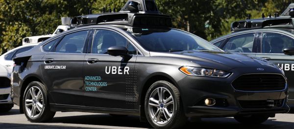A group of self driving Uber vehicles position themselves to take journalists on rides during a media preview at Uber's Advanced Technologies Center in Pittsburgh, Monday, Sept. 12, 2016. - Sputnik International