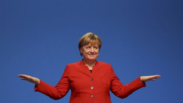 German Chancellor and leader of the conservative Christian Democratic Union party CDU Angela Merkel reacts after her speech at the CDU party convention in Essen, Germany, December 6, 2016. - Sputnik International