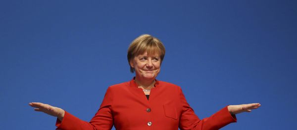 German Chancellor and leader of the conservative Christian Democratic Union party CDU Angela Merkel reacts after her speech at the CDU party convention in Essen, Germany, December 6, 2016. - Sputnik International