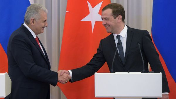 Russian Prime Minister Dmitry Medvedev and his Turkish counterpart Binali Yildirim during a joint press conference on December 6, 2016 Russian Prime Minister Dmitry Medvedev and his Turkish counterpart Binali Yildirim during a joint press conference on December 6, 2016 - Sputnik International