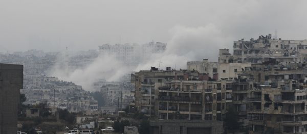 Smoke rises after rebel fighters launch a mortar shell on a residential neighborhood in western Aleppo, Syria - Sputnik International