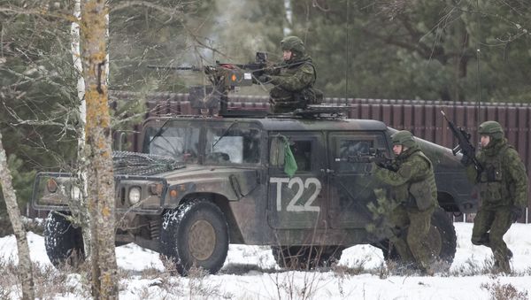 Soldiers take part in the NATO military exercise 'Iron Sword 2016' at a training range in Pabrade, north of the capital Vilnius, Lithuania on Friday, Dec. 2, 2016. The US and NATO have beefed up their presence throughout Eastern Europe significantly over the past two years following the outbreak of the crisis in Ukraine. - Sputnik International