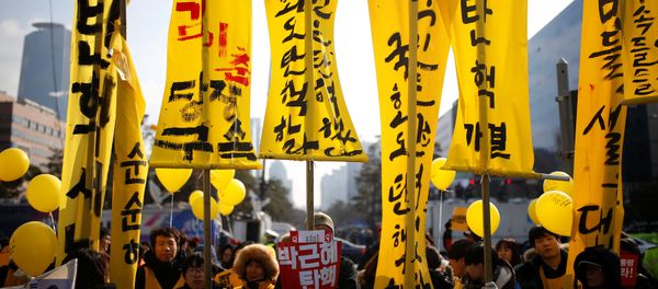 Protesters attend a rally demanding the impeachment of South Korean President Park Geun-hye in front of the National Assembly in Seoul, South Korea, December 9, 2016. The sign reads Impeach Park Geun-hye. Protesters attend a rally demanding the impeachment of South Korean President Park Geun-hye in front of the National Assembly in Seoul, South Korea, December 9, 2016. The sign reads Impeach Park Geun-hye. - Sputnik International