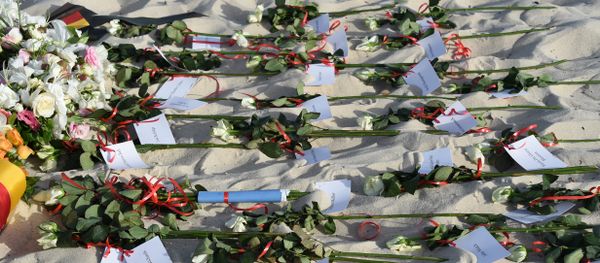 Flowers lie on the beach on June 26, 2016, during a ceremony attended by British and Tunisian officials in memory of those killed a year ago by a jihadist gunman in front of the Riu Imperial Marhaba Hotel in Port el Kantaoui, on the outskirts of Sousse south of the capital Tunis. Flowers lie on the beach on June 26, 2016, during a ceremony attended by British and Tunisian officials in memory of those killed a year ago by a jihadist gunman in front of the Riu Imperial Marhaba Hotel in Port el Kantaoui, on the outskirts of Sousse south of the capital Tunis. - Sputnik International
