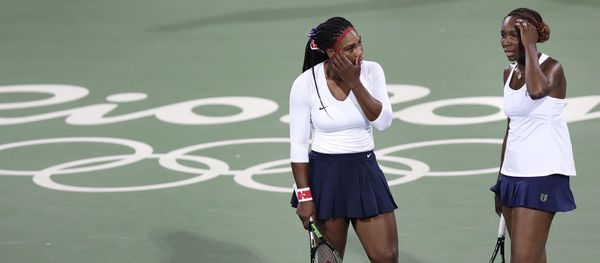 Venus Williams, of the United States, right, talks with her sister Serena after losing a point in a doubles match against Lucie Safarova and Barbora Strycova, of the Czech Republic, at the 2016 Summer Olympics in Rio de Janeiro, Brazil Venus Williams, of the United States, right, talks with her sister Serena after losing a point in a doubles match against Lucie Safarova and Barbora Strycova, of the Czech Republic, at the 2016 Summer Olympics in Rio de Janeiro, Brazil - Sputnik International