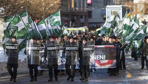 The neo-nazi Nordic Resistance Movement (Nordiska motstandsrorelsens) sympathisers demonstrate in central Stockholm on November 12, 2016 to protest against migrants. - Sputnik International