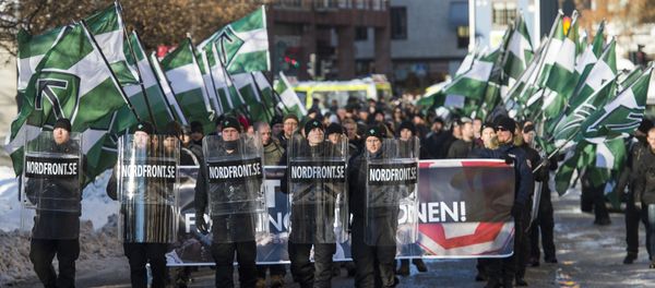 The neo-nazi Nordic Resistance Movement (Nordiska motstandsrorelsens) sympathisers demonstrate in central Stockholm on November 12, 2016 to protest against migrants. - Sputnik International