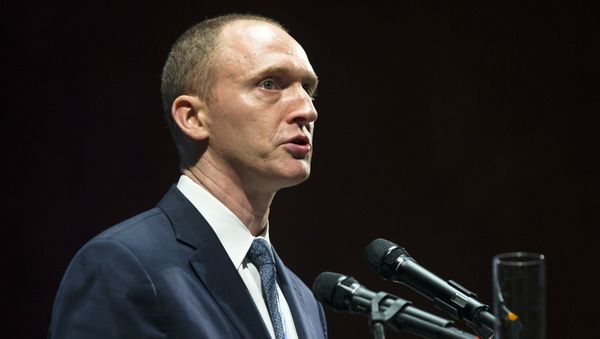 Carter Page, an adviser to U.S. Republican presidential candidate Donald Trump, speaks at the graduation ceremony for the New Economic School in Moscow, Russia. (File) - Sputnik International
