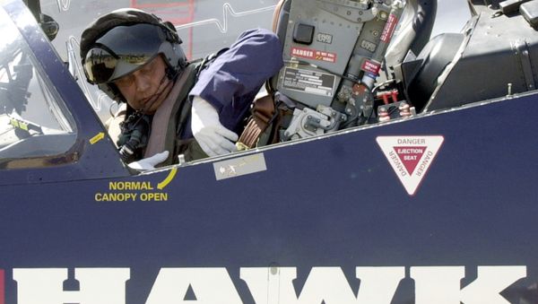 Chief of Indian Air Force Air Chief marshal SP Tyagi unfastens his seatbelt as he gets out of a BAE systems HAWK advanced jet trainer after flying it over the Yehlanka Air force Station on the outskirts of Bangalore on the eve of the Aero India 2005 aerospace show. (File) Chief of Indian Air Force Air Chief marshal SP Tyagi unfastens his seatbelt as he gets out of a BAE systems HAWK advanced jet trainer after flying it over the Yehlanka Air force Station on the outskirts of Bangalore on the eve of the Aero India 2005 aerospace show. (File) - Sputnik International