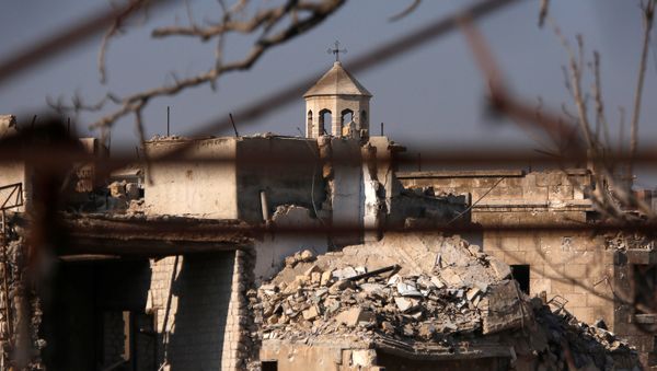 A part of a church is seen amid the damage in the government-controlled area of the Old City of Aleppo, Syria December 10, 2016 A part of a church is seen amid the damage in the government-controlled area of the Old City of Aleppo, Syria December 10, 2016 - Sputnik International