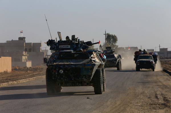 Iraqi security forces members drive a military vehicle in Qaraqosh, near Mosul, Iraq December 9, 2016 - Sputnik International