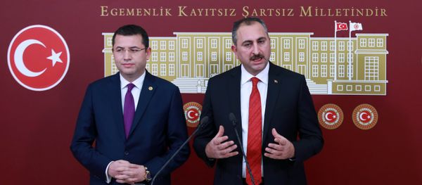 General Secretary of Turkish Justice and Development Party (AKP) Abdulhamit Gul (R) and Turkish Nationalist Movement Party's (MHP) deputy of Afyonkarahisar Mehmet Parsak (L) address a press conference at the Grand National Assembly of Turkey (TBMM) in Ankara on December 10, 2016, after a constitutional amendment bill was submitted to Turkish parliament General Secretary of Turkish Justice and Development Party (AKP) Abdulhamit Gul (R) and Turkish Nationalist Movement Party's (MHP) deputy of Afyonkarahisar Mehmet Parsak (L) address a press conference at the Grand National Assembly of Turkey (TBMM) in Ankara on December 10, 2016, after a constitutional amendment bill was submitted to Turkish parliament - Sputnik International