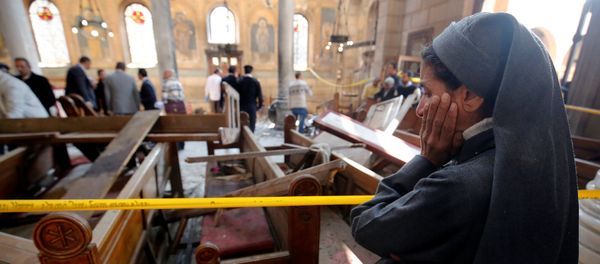 A nun cries as she stands at the scene inside Cairo's Coptic cathedral, following a bombing, in Egypt December 11, 2016 A nun cries as she stands at the scene inside Cairo's Coptic cathedral, following a bombing, in Egypt December 11, 2016 - Sputnik International