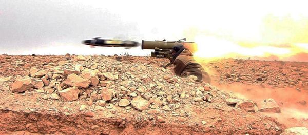 This image posted online on Saturday, Dec. 10, 2016, by supporters of the Islamic State militant group on an anonymous photo sharing website, purports to show a gunman firing an anti-tank missile at Syrian troops north of Palmyra city, in Homs Provence, Syria This image posted online on Saturday, Dec. 10, 2016, by supporters of the Islamic State militant group on an anonymous photo sharing website, purports to show a gunman firing an anti-tank missile at Syrian troops north of Palmyra city, in Homs Provence, Syria - Sputnik International