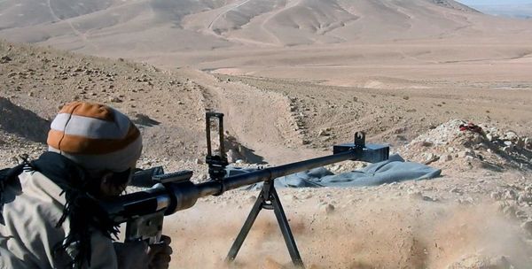 This image posted online on Saturday, Dec. 10, 2016, by Daesh supporters on an anonymous photo sharing website, purports to show a gunman firing at an unseen target, north of Palmyra in Homs Provence, Syria - Sputnik International