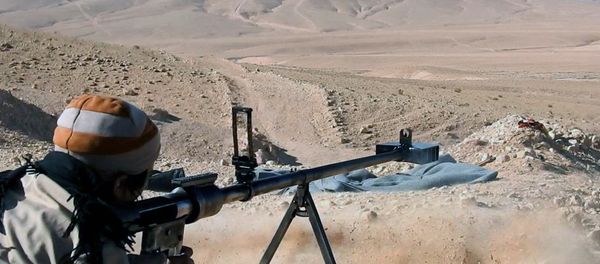 This image posted online on Saturday, Dec. 10, 2016, by Daesh supporters on an anonymous photo sharing website, purports to show a gunman firing at an unseen target, north of Palmyra in Homs Provence, Syria - Sputnik International