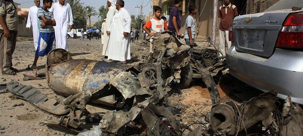 Wreckage of a car after a car bomb exploded in the former insurgent stronghold of Fallujah (File) - Sputnik International