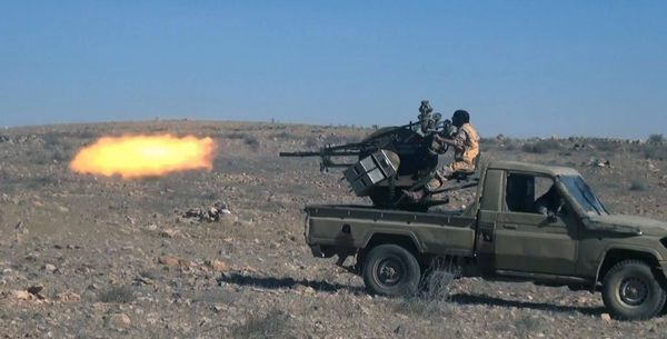 This image posted online on Dec. 10, 2016, by Daesh supporters on an anonymous photo sharing website, purports to show a gun-mounted vehicle operated by Daesh firing at Syrian troops, north of Palmyra - Sputnik International