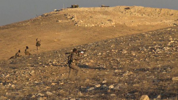 This image posted online on Saturday, Dec. 10, 2016, by supporters of the Islamic State militant group on an anonymous photo sharing website, shows gunmen with a shoulder-propelled weapon east of Palmyra city, in Homs Provence, Syria This image posted online on Saturday, Dec. 10, 2016, by supporters of the Islamic State militant group on an anonymous photo sharing website, shows gunmen with a shoulder-propelled weapon east of Palmyra city, in Homs Provence, Syria - Sputnik International