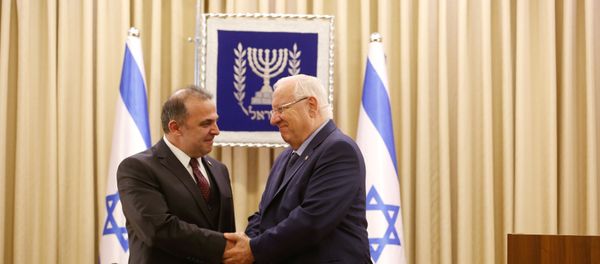 Israeli President Reuven Rivlin shakes hands with Turkish ambassador to Israel Kemal Okem during a ceremony of receiving diplomatic credentials at Rivlin official residence in Jerusalem December 12, 2016 Israeli President Reuven Rivlin shakes hands with Turkish ambassador to Israel Kemal Okem during a ceremony of receiving diplomatic credentials at Rivlin official residence in Jerusalem December 12, 2016 - Sputnik International