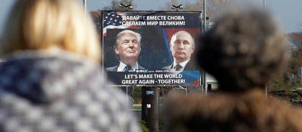 A billboard showing a pictures of US president-elect Donald Trump and Russian President Vladimir Putin is seen through pedesterians in Danilovgrad, Montenegro, November 16, 2016 A billboard showing a pictures of US president-elect Donald Trump and Russian President Vladimir Putin is seen through pedesterians in Danilovgrad, Montenegro, November 16, 2016 - Sputnik International