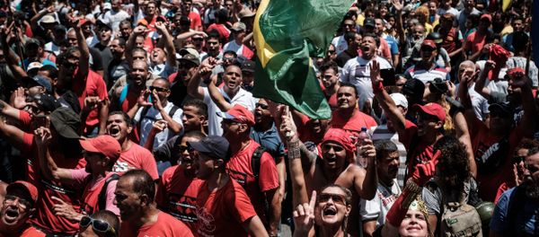 Protesters shout slogans during a public servants' demonstration against austerity measures in front of the Rio de Janeiro state Assembly (ALERJ), in Rio de Janeiro, Brazil, on December 12, 2016 Protesters shout slogans during a public servants' demonstration against austerity measures in front of the Rio de Janeiro state Assembly (ALERJ), in Rio de Janeiro, Brazil, on December 12, 2016 - Sputnik International