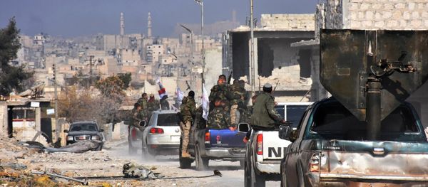 Syrian pro-government forces patrol Aleppo's Sheikh Saeed district, on December 12, 2016, after troops retook the area from rebel fighters Syrian pro-government forces patrol Aleppo's Sheikh Saeed district, on December 12, 2016, after troops retook the area from rebel fighters - Sputnik International