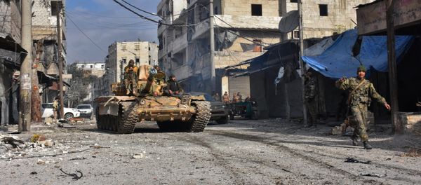 Syrian pro-government forces patrol Aleppo's eastern al-Salihin neighbourhood on December 12, 2016 after troops retook the area from rebel fighters Syrian pro-government forces patrol Aleppo's eastern al-Salihin neighbourhood on December 12, 2016 after troops retook the area from rebel fighters - Sputnik International