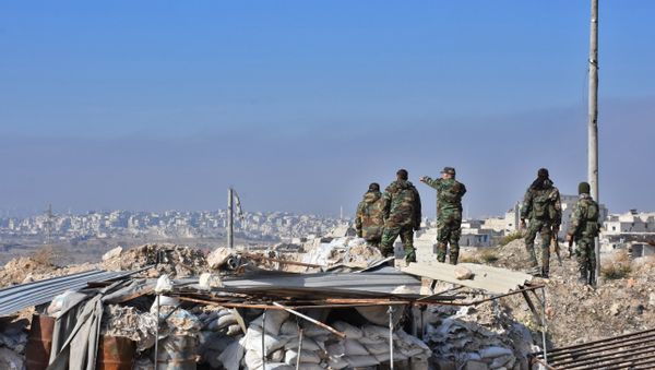 Syrian pro-government forces patrol Aleppo's Sheikh Saeed district, on December 12, 2016, after troops retook the area from rebel fighters Syrian pro-government forces patrol Aleppo's Sheikh Saeed district, on December 12, 2016, after troops retook the area from rebel fighters - Sputnik International