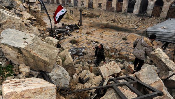 A member of forces loyal to Syria's President Bashar al-Assad attempts to erect the Syrian national flag inside the Umayyad mosque, in the government-controlled area of Aleppo, during a media tour, Syria December 13, 2016 A member of forces loyal to Syria's President Bashar al-Assad attempts to erect the Syrian national flag inside the Umayyad mosque, in the government-controlled area of Aleppo, during a media tour, Syria December 13, 2016 - Sputnik International