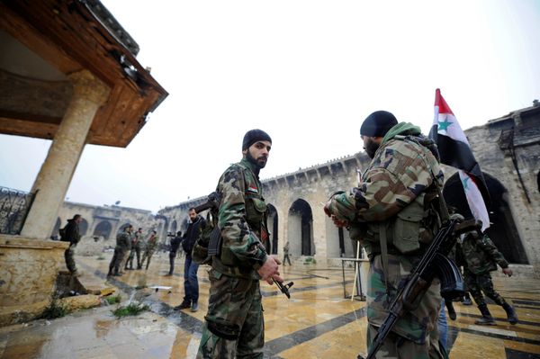 Forces loyal to Syria's President Bashar al-Assad stand inside the Umayyad mosque, in the government-controlled area of Aleppo, during a media tour, Syria December 13, 2016 Forces loyal to Syria's President Bashar al-Assad stand inside the Umayyad mosque, in the government-controlled area of Aleppo, during a media tour, Syria December 13, 2016 - Sputnik International