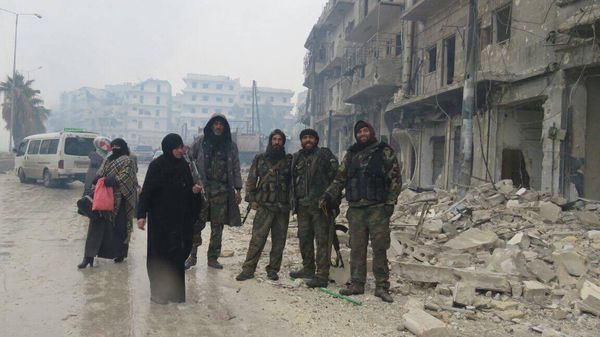 Syrian Army soldiers looking victorious after the liberation of Aleppo. File photo Syrian Army soldiers looking victorious after the liberation of Aleppo. File photo - Sputnik International