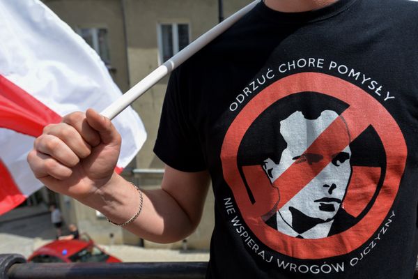 A participant in a march in memory of the Volhynia massacre victims, in Przemysl, Poland. Collaborationist militia aligned with Stephan Bandera (pictured) ethnically cleansed large areas of western Ukraine during the Second World War, killing tens of thousands of civilians. A participant in a march in memory of the Volhynia massacre victims, in Przemysl, Poland. Collaborationist militia aligned with Stephan Bandera (pictured) ethnically cleansed large areas of western Ukraine during the Second World War, killing tens of thousands of civilians. - Sputnik International